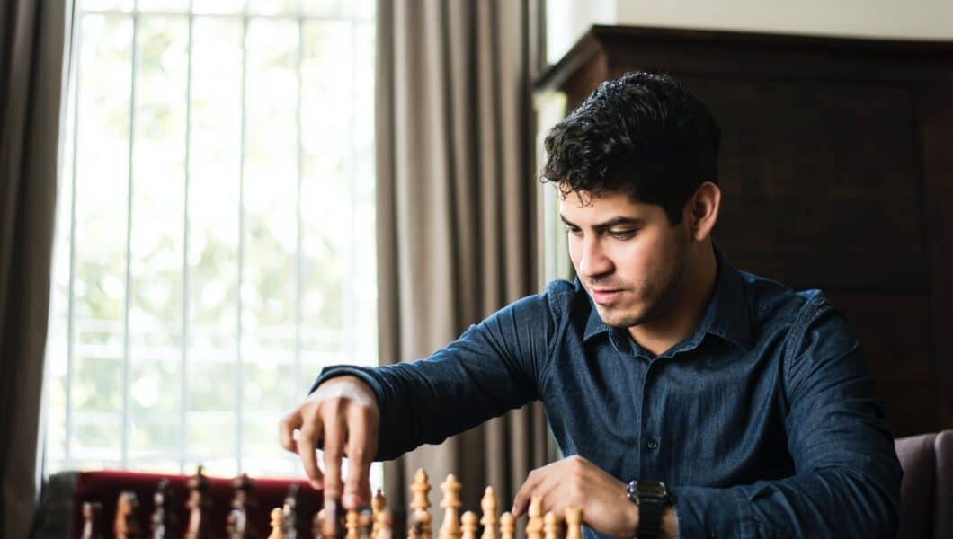 a guy playing chess