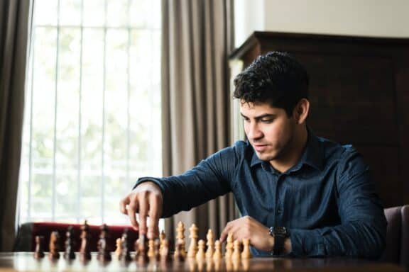 a guy playing chess