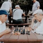 senior citizen playing chess
