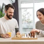 young couple playing chess