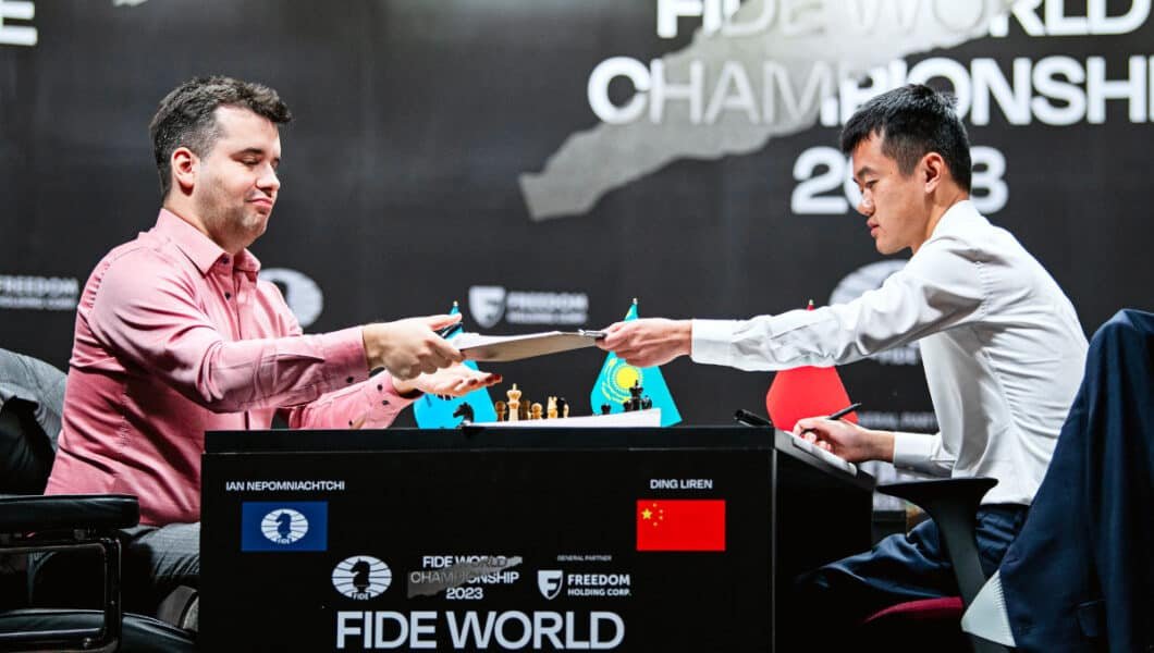 GM Ian Nepomniachtchi and GM Ding Liren after their first game in FIDE World Championship Game